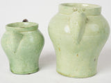 Collectible 1950s pea green creamers