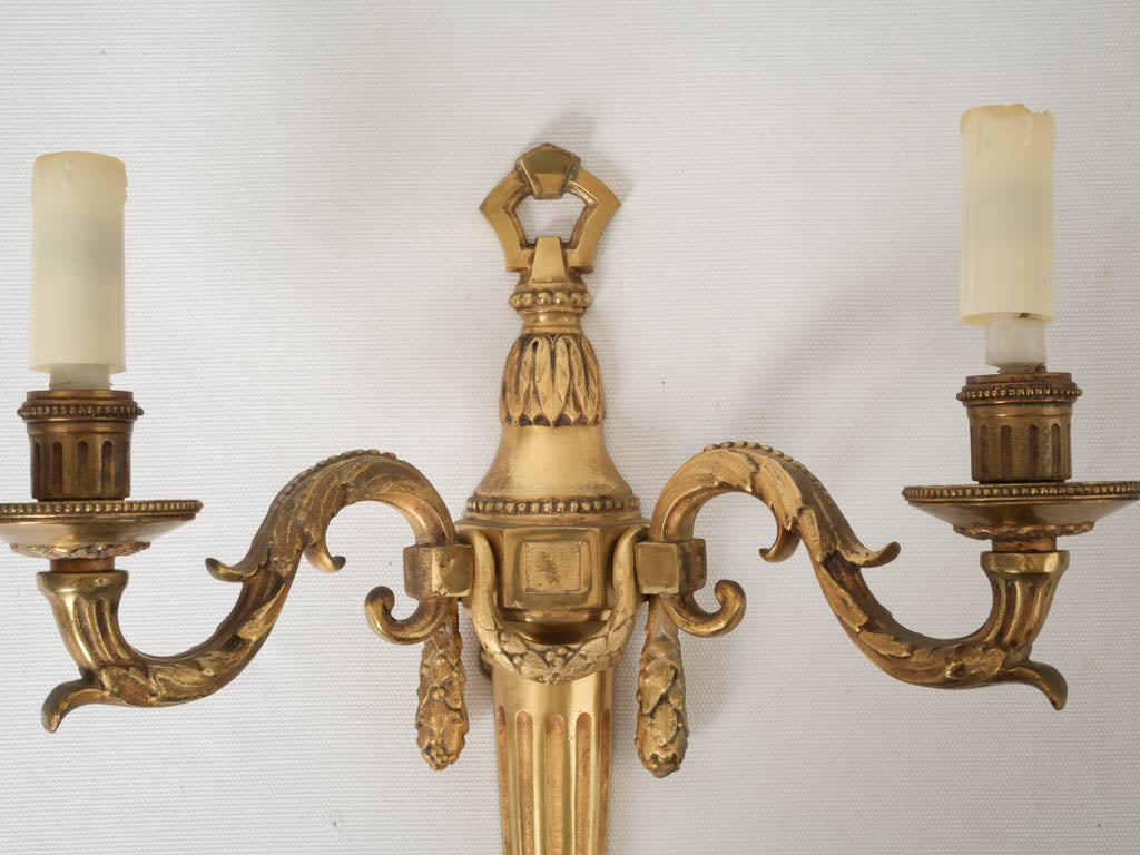 Victory symbol laurel gilded sconces