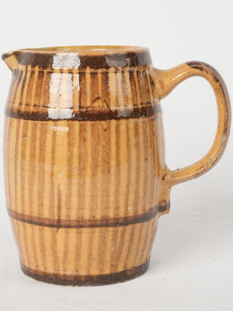 Rustic brown barrel-shaped pitcher