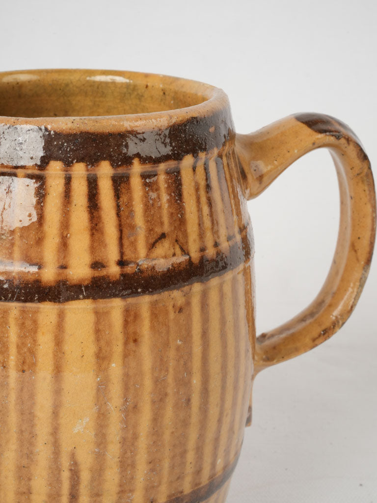 Rich brown glazed wine barrel pitcher