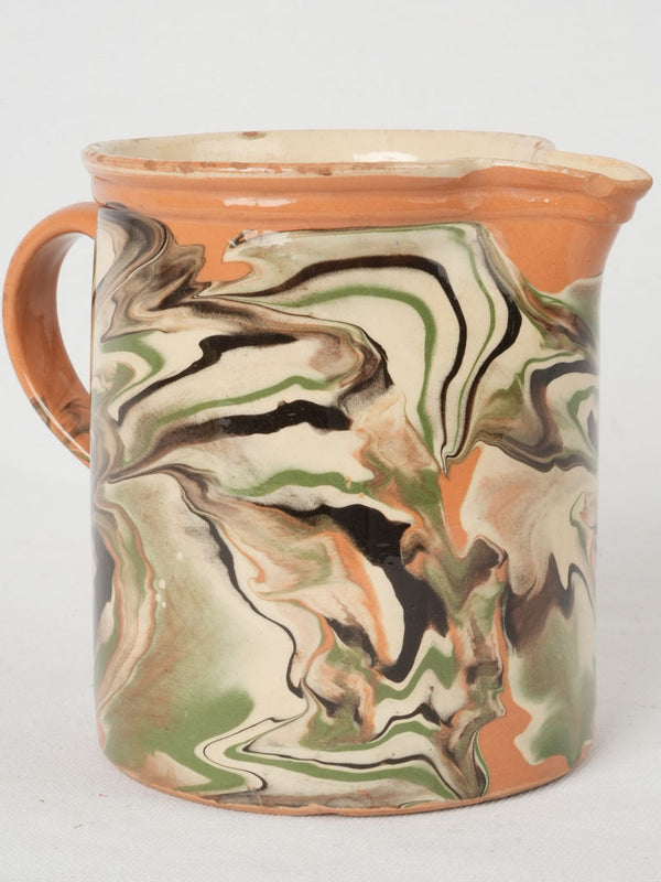 Rustic ocher and green jug