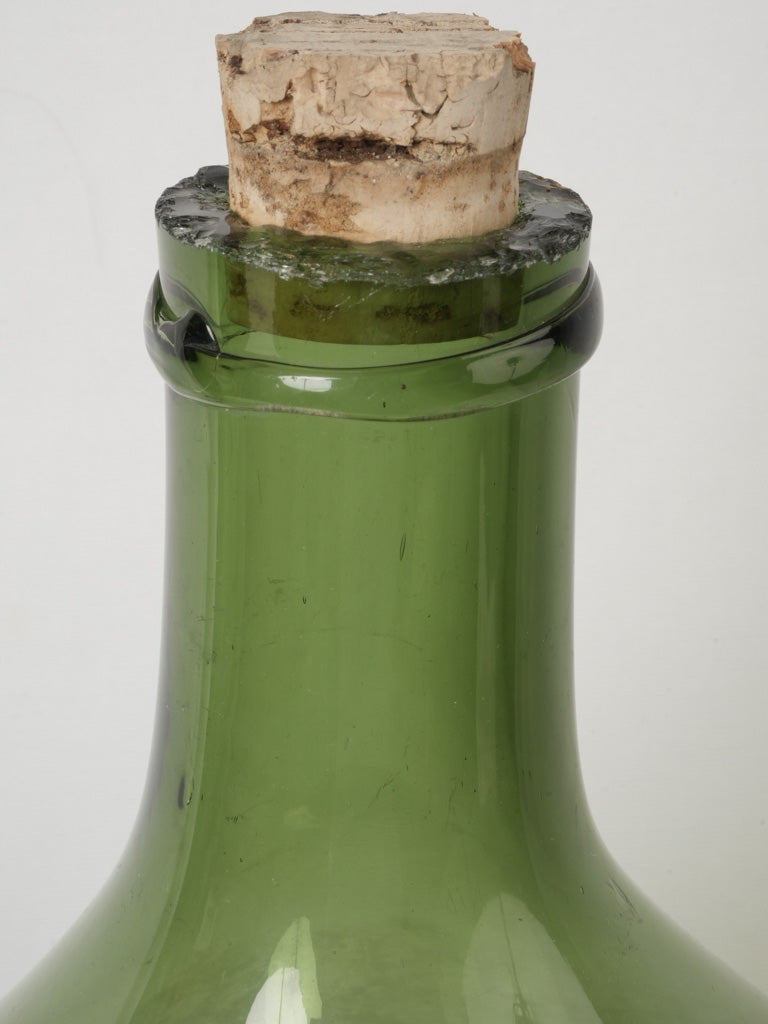 Historical Dame Jeanne wine storage bottle