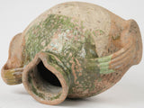 Elegant, weathered green antique vessel