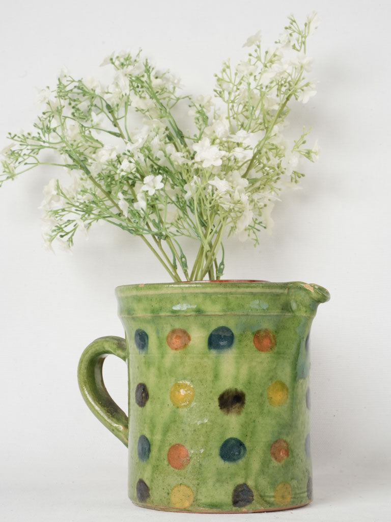 Vintage green-spotted ceramic pitcher