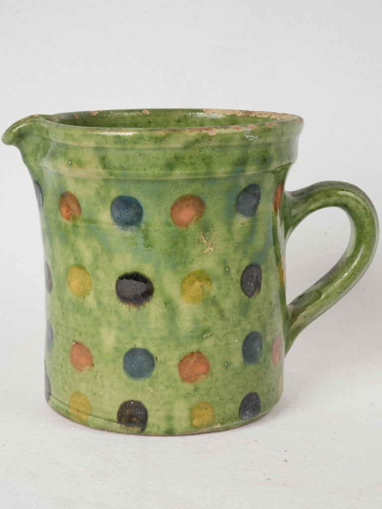 Traditional Alpine green-dotted pottery pitcher