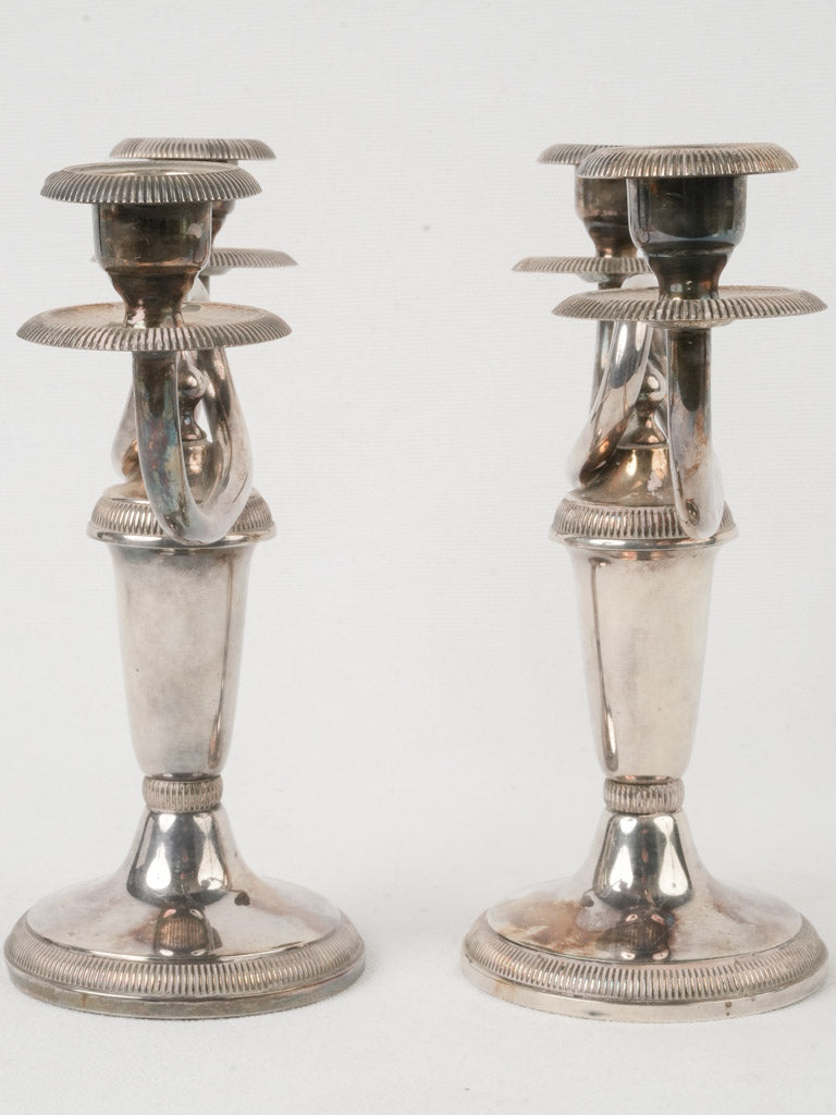 Graceful double-arm silverware pieces  