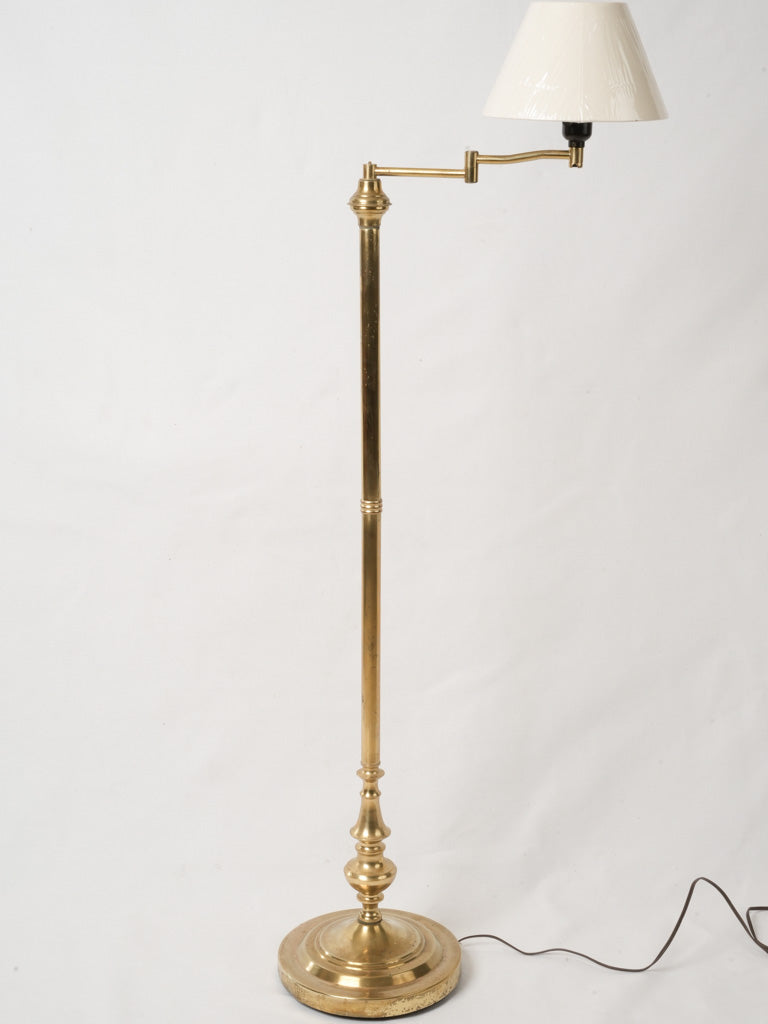 Vintage brass swing-arm floor lamp