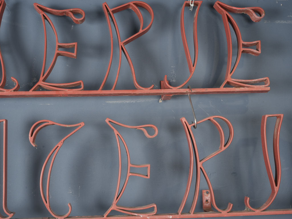 Traditional red Boucherie shop sign