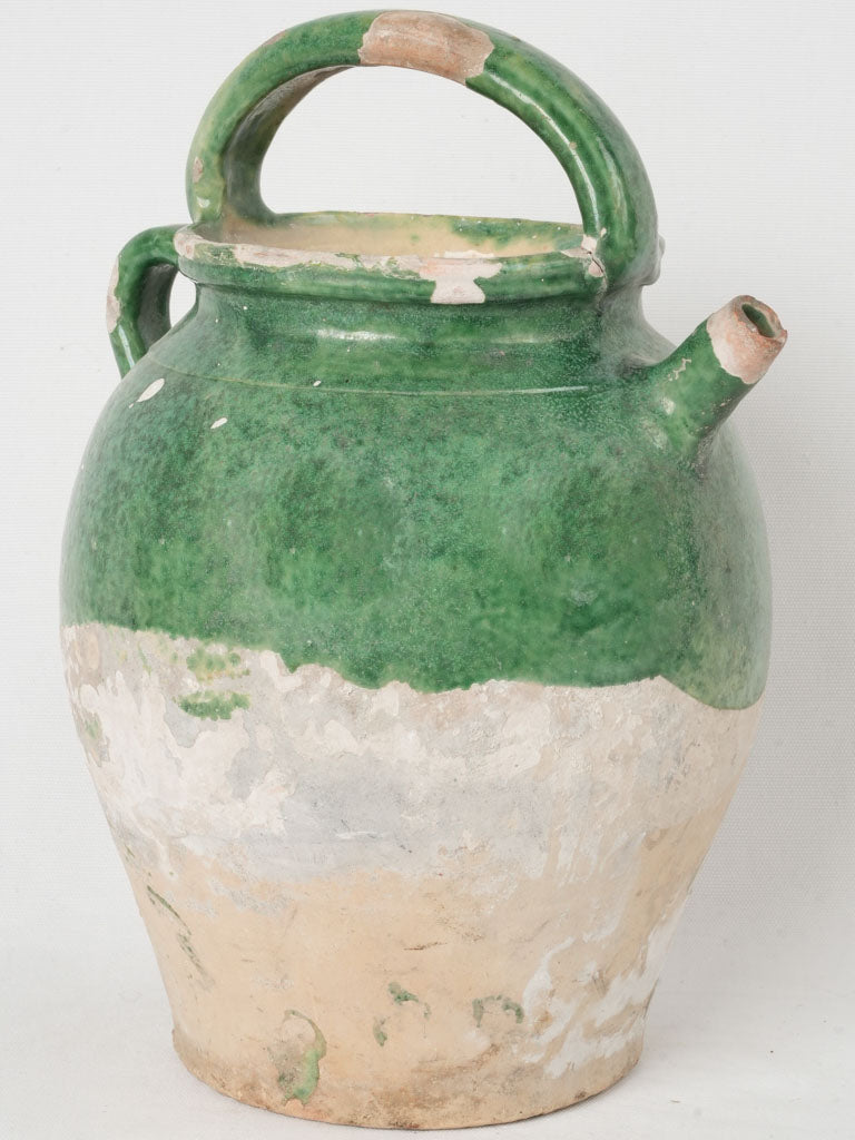 Aged large dark green glaze cruche