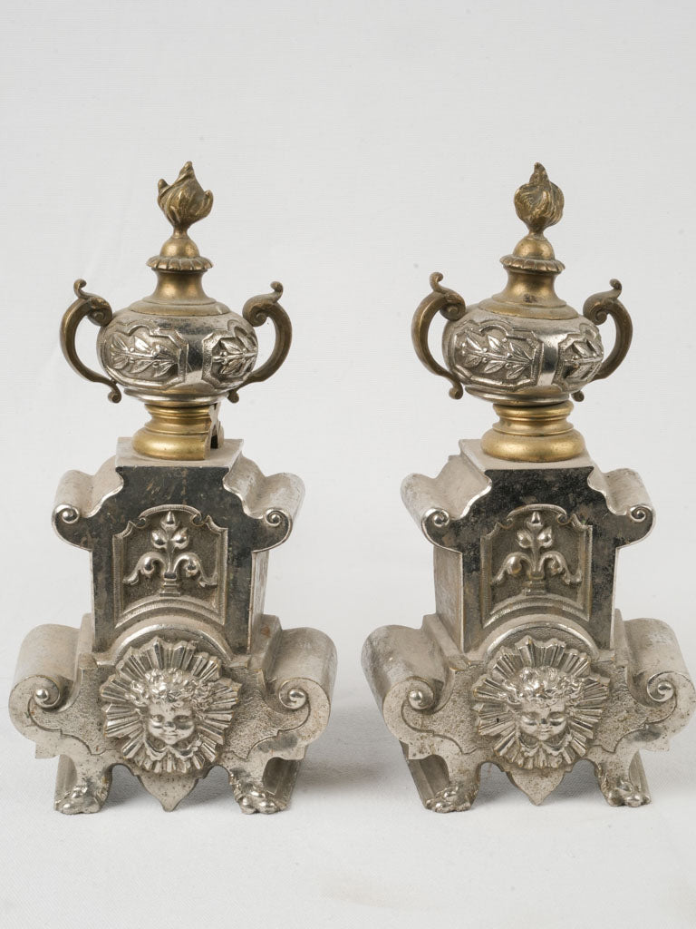 Intricate gilt finish andirons  