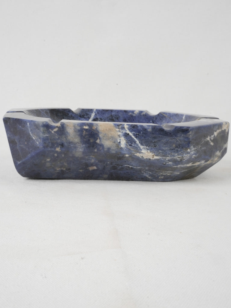 "Blue veined ashtray"