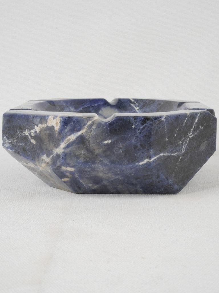 "Faceted stone design ashtray"