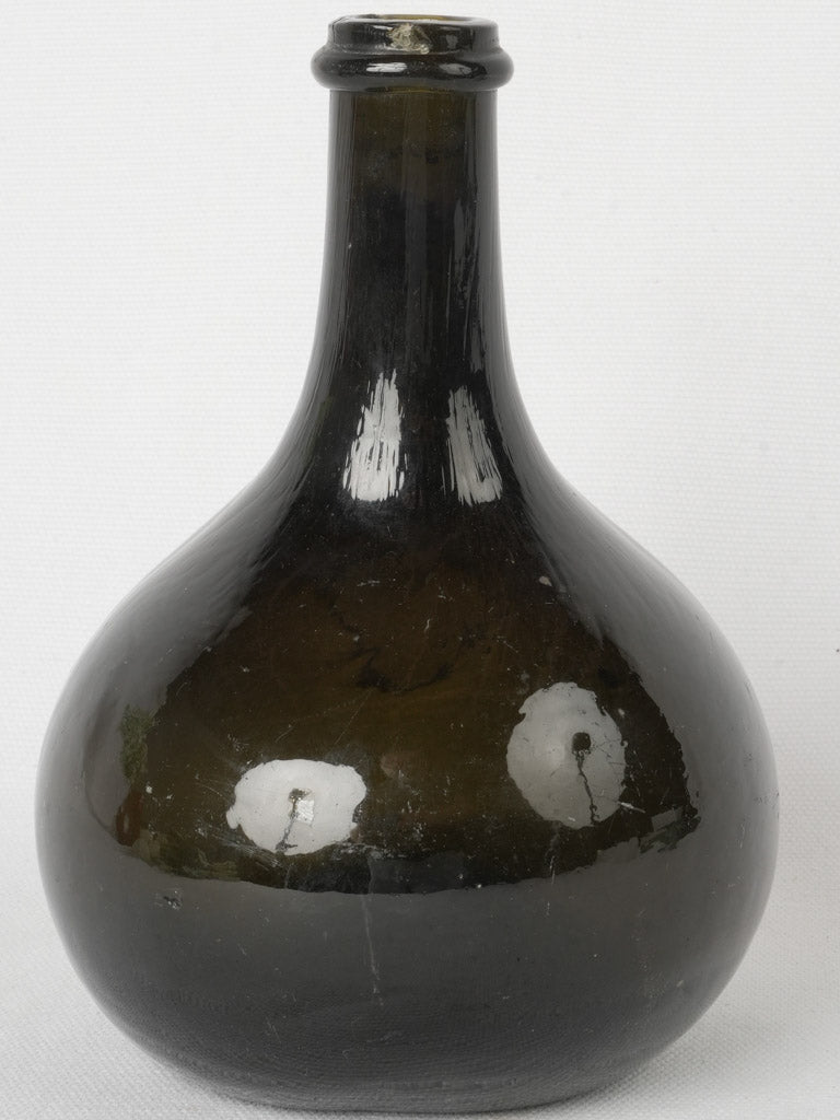 Refined 19th-century black glass spirits