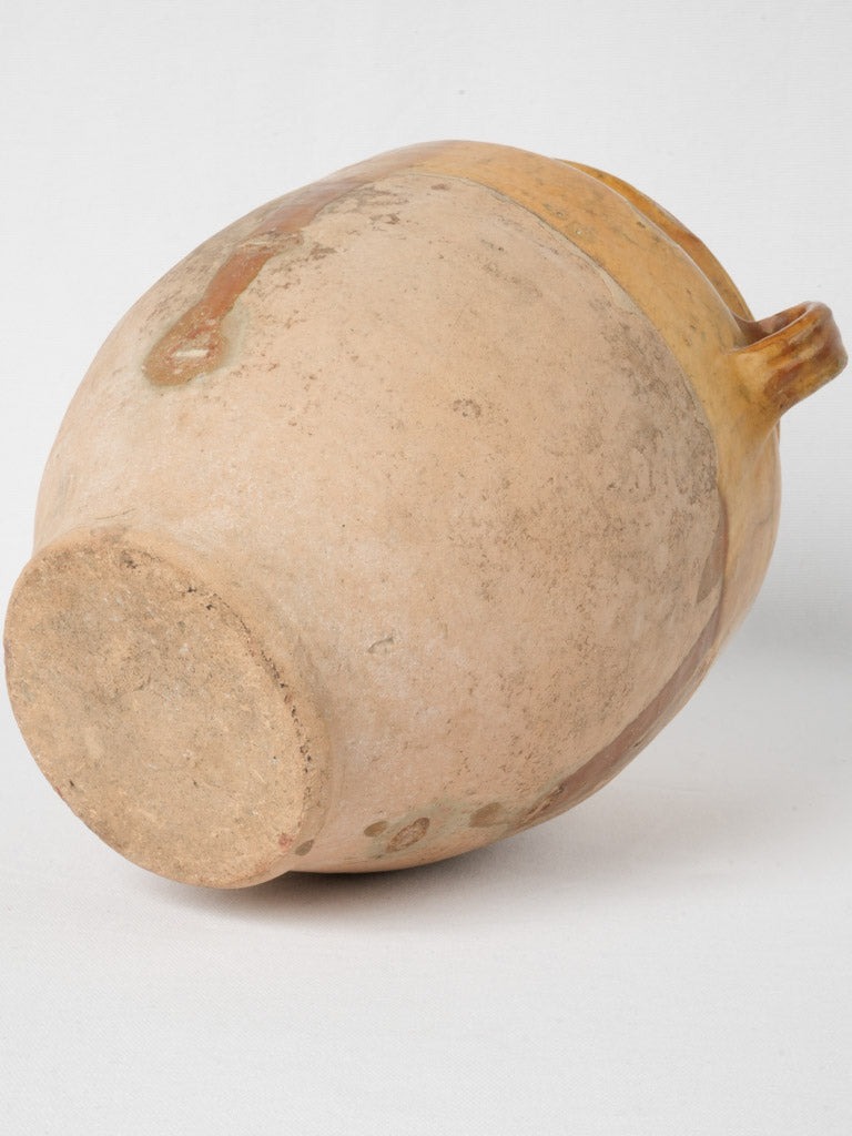 Elegant taper-based French pottery vessel