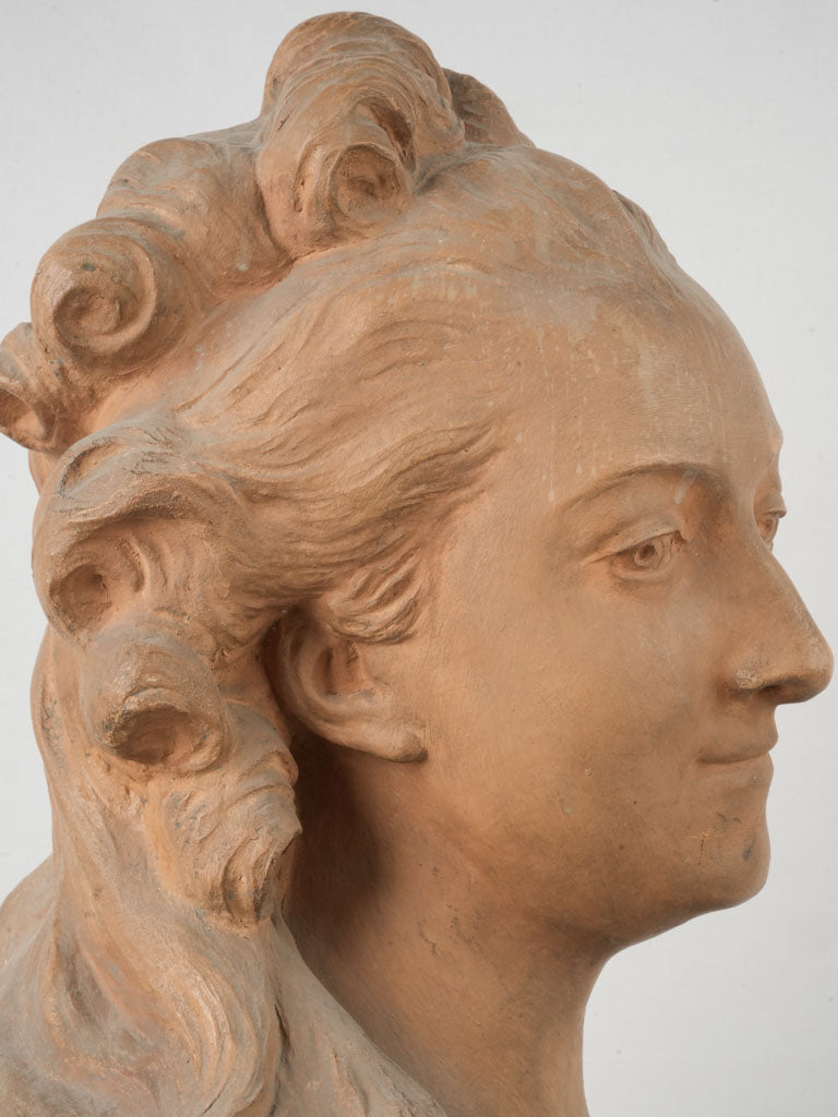 Warm-toned sculpture with draped garment  