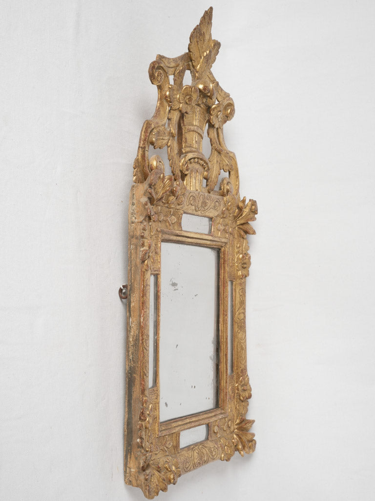 Intricate Baroque period mirrored frame