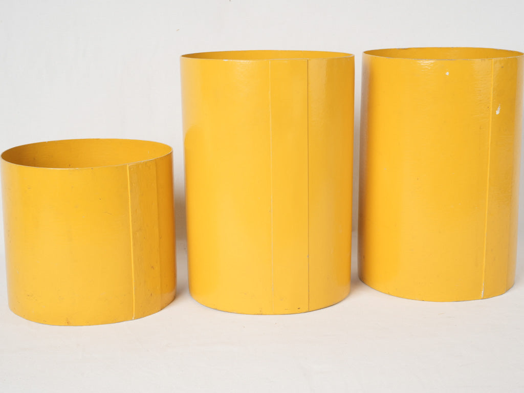 Celebrated 70s yellow recycling containers 