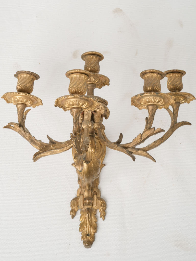 Ornate gilded bronze wall fixtures