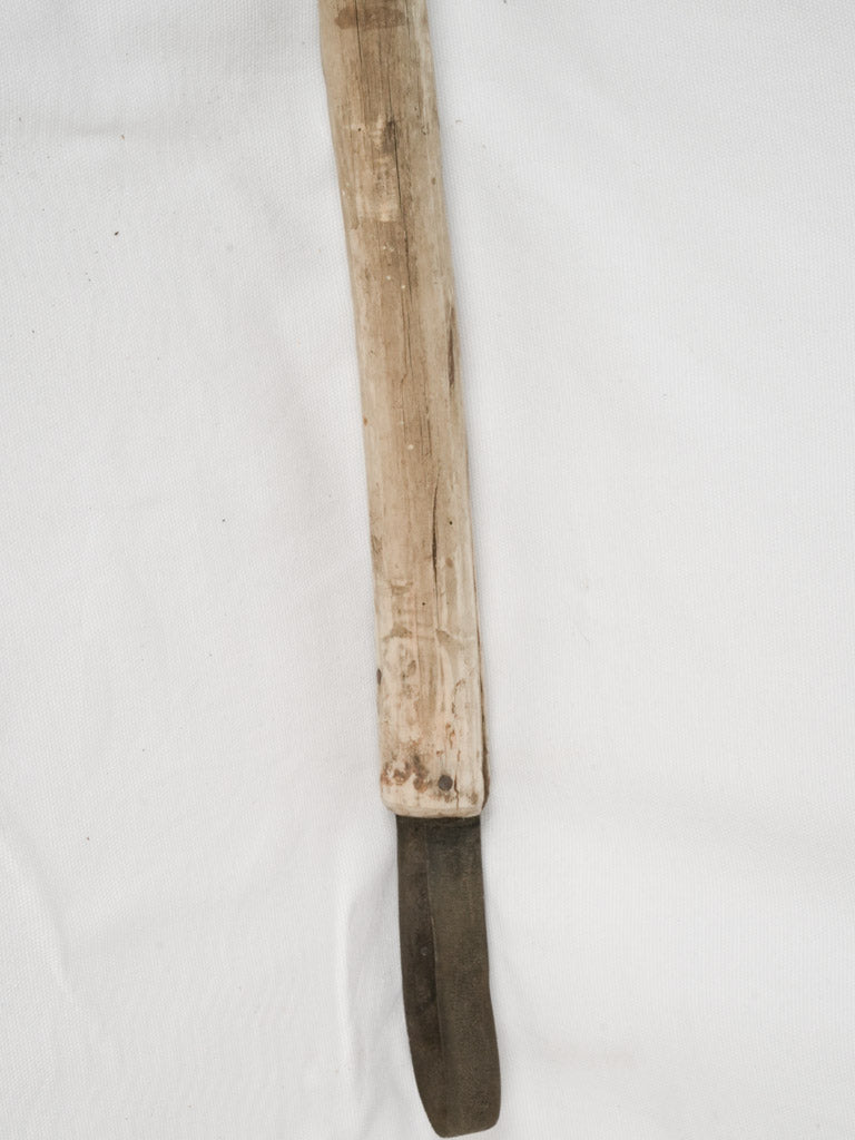 Time-worn French vineyard tool