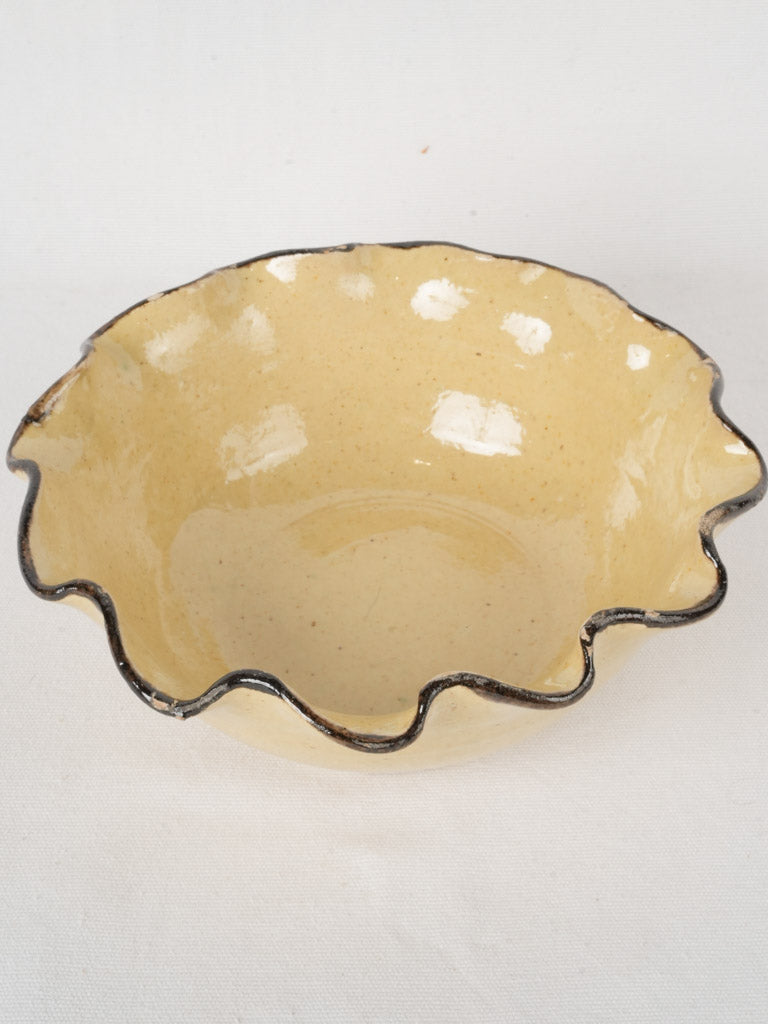 Handcrafted scalloped-edge pottery