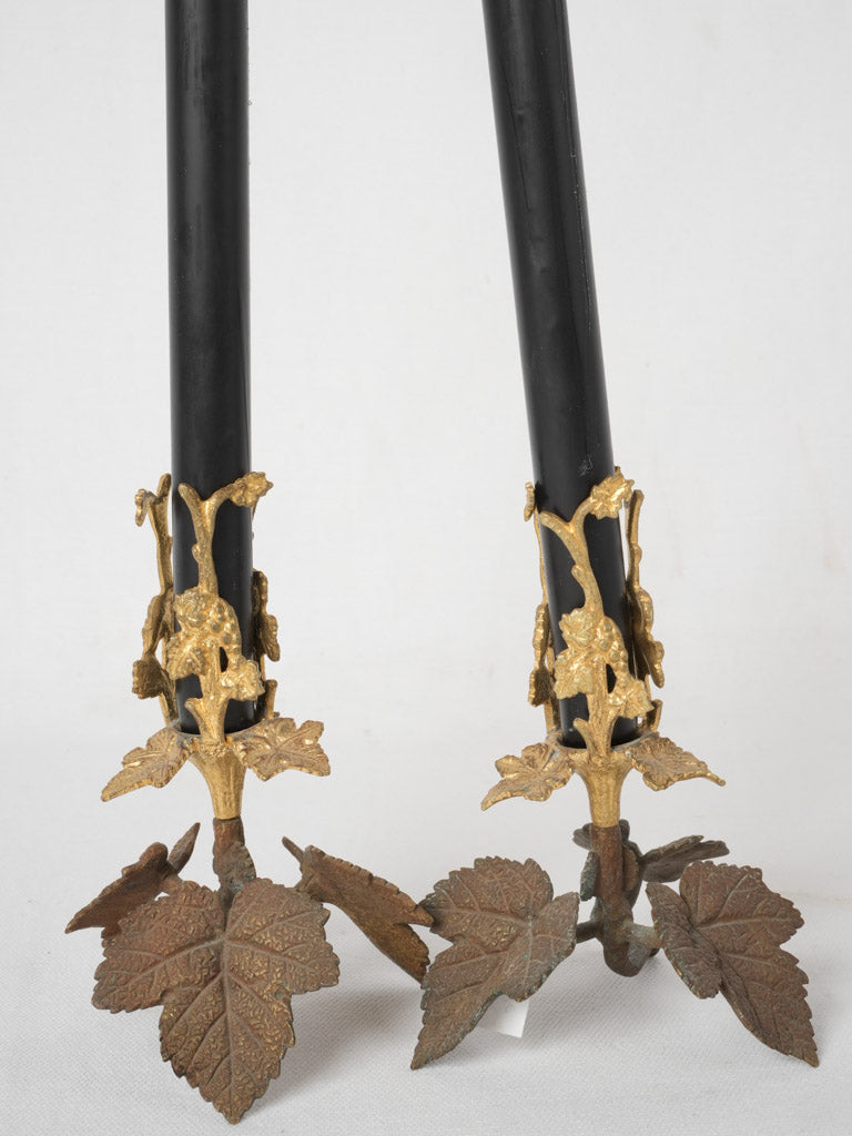 Patinated bronze vine leaf candlesticks