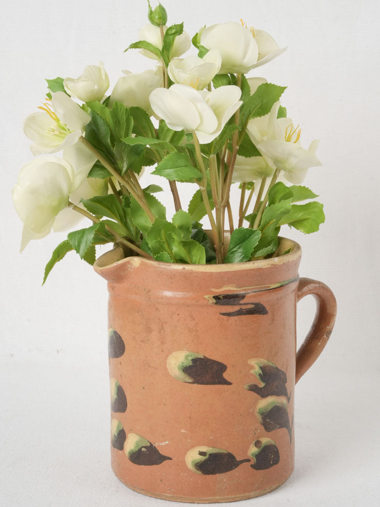 Antique ocher-glazed ceramic pitcher  