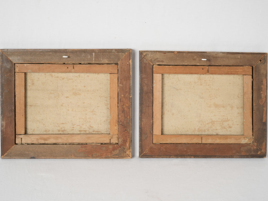 Aged wooden framed oil paintings 