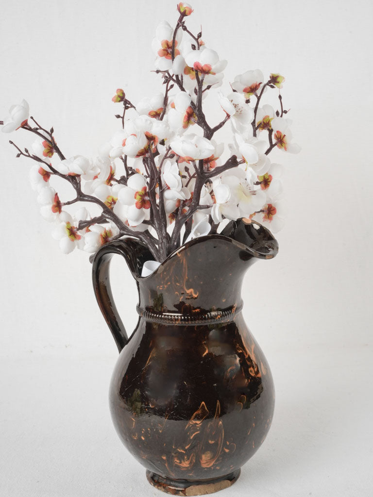 Elegant antique ceramic pitcher