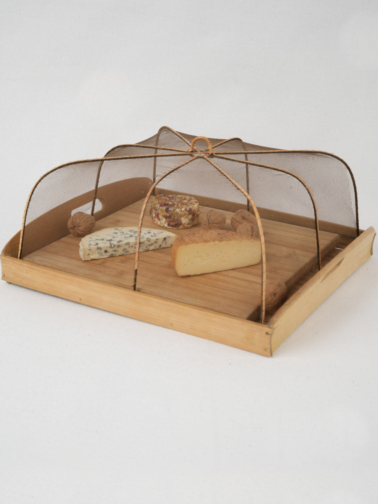 Rustic French cheese board with mesh