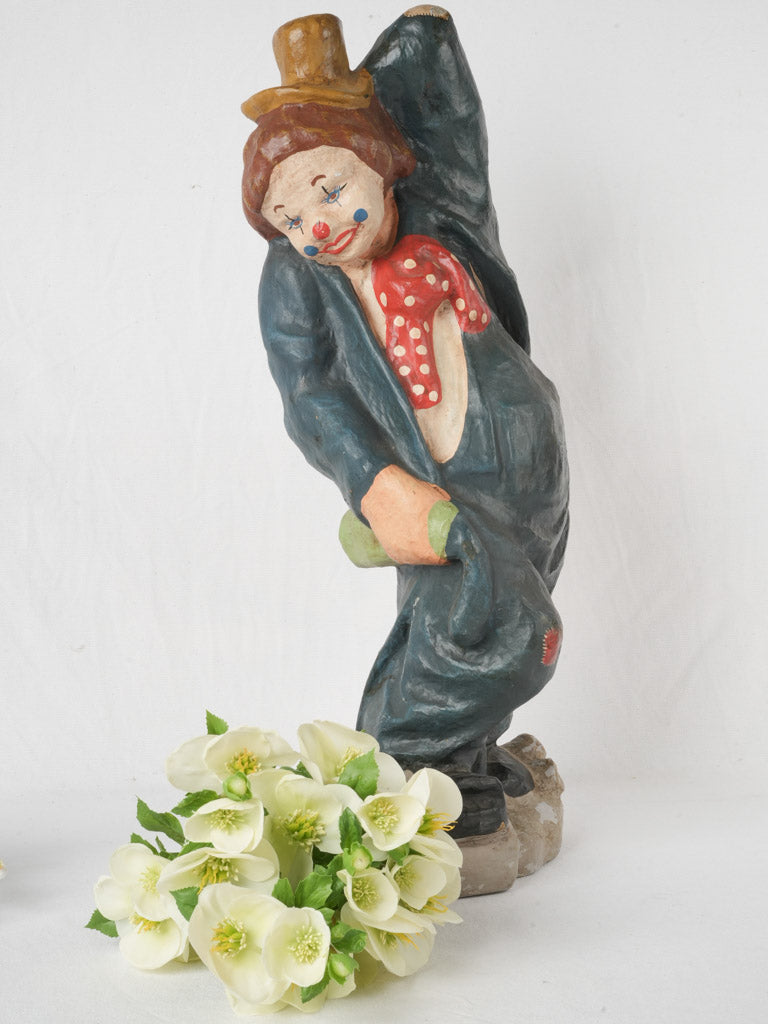 Charming fairground clown statue