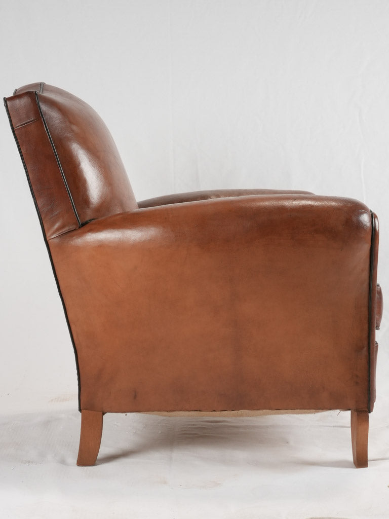 Reserved LM Petite French leather club chair w/ moustache back - 1930s