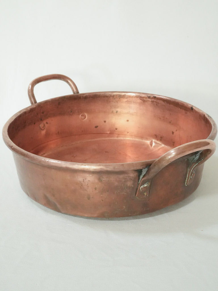 Vintage two-handled copper jam pot