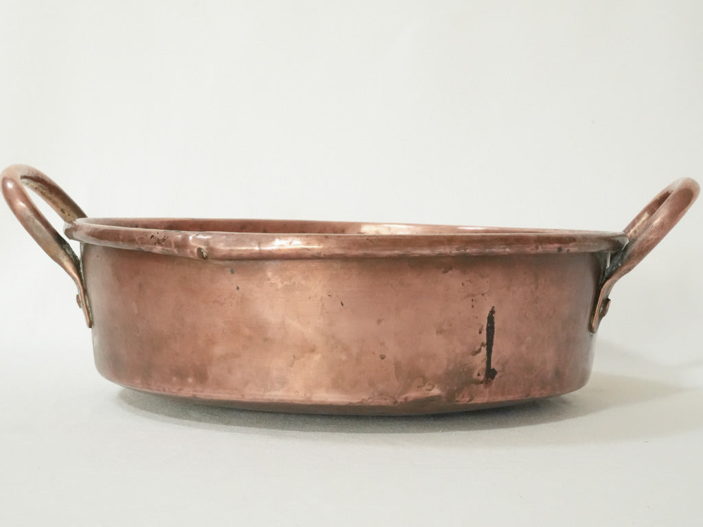 Antique weathered copper cooking container