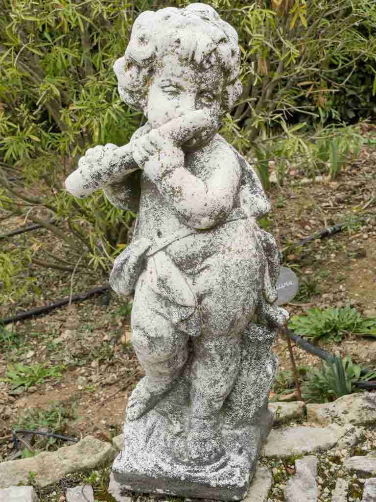 Reconstituted stone whimsical cherub statue