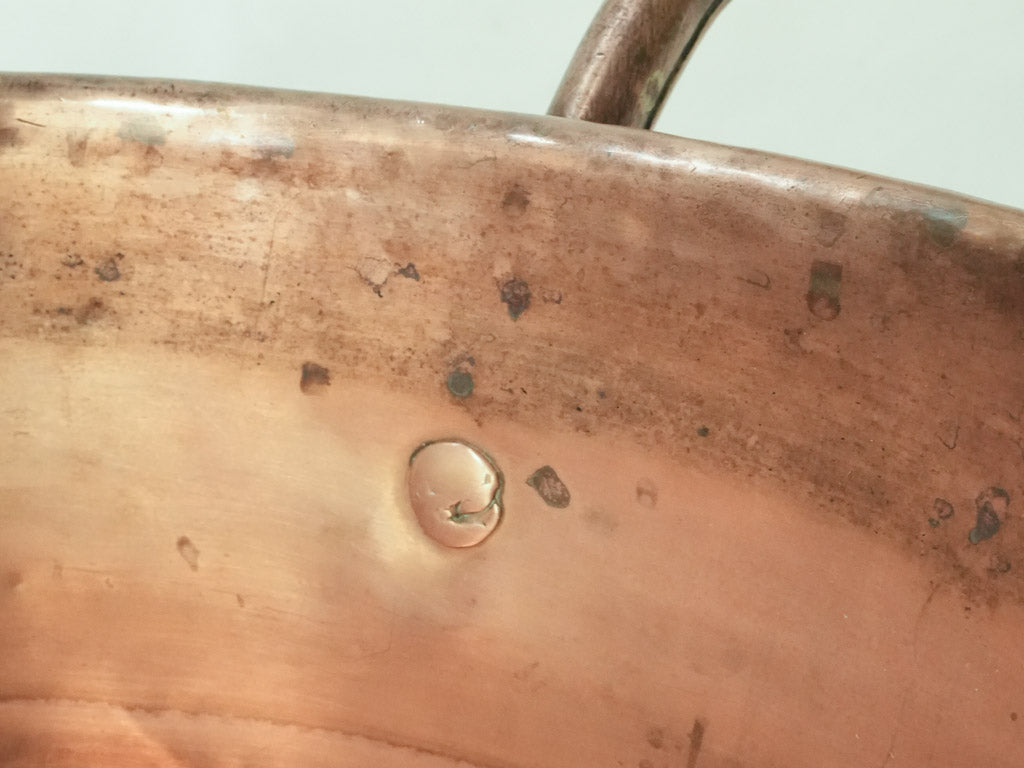 Weathered copper cookware item