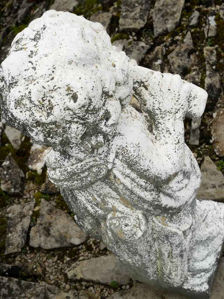 Provencal cast stone musical cherub