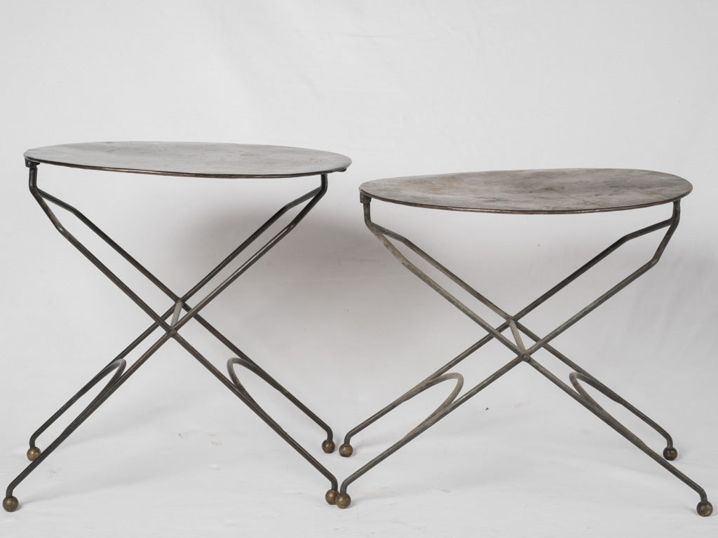 Antique-inspired metal garden tables