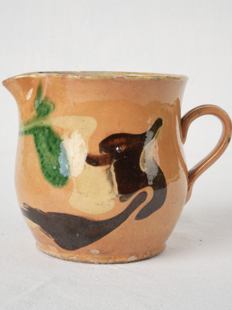 Charming pale yellow glaze creamer