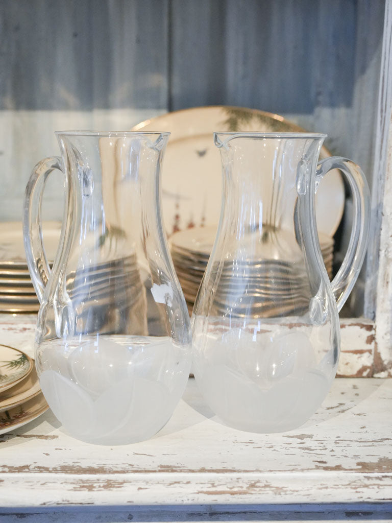 Antiqued clear glass pitchers