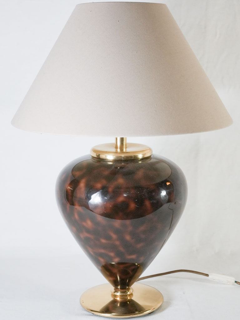 Timeless ceramic-base brass-detail lamp