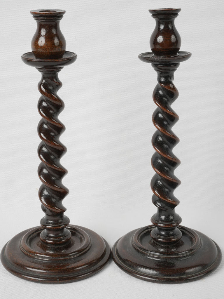 Refined dark wood candlesticks