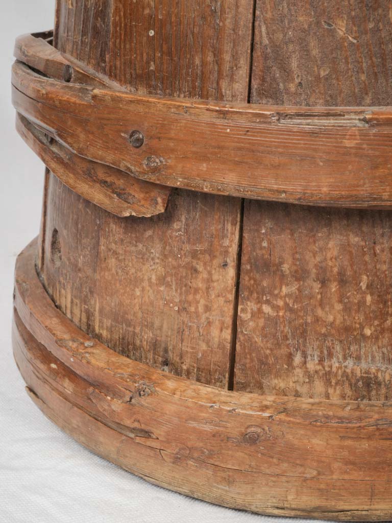 Aged wooden butter churn