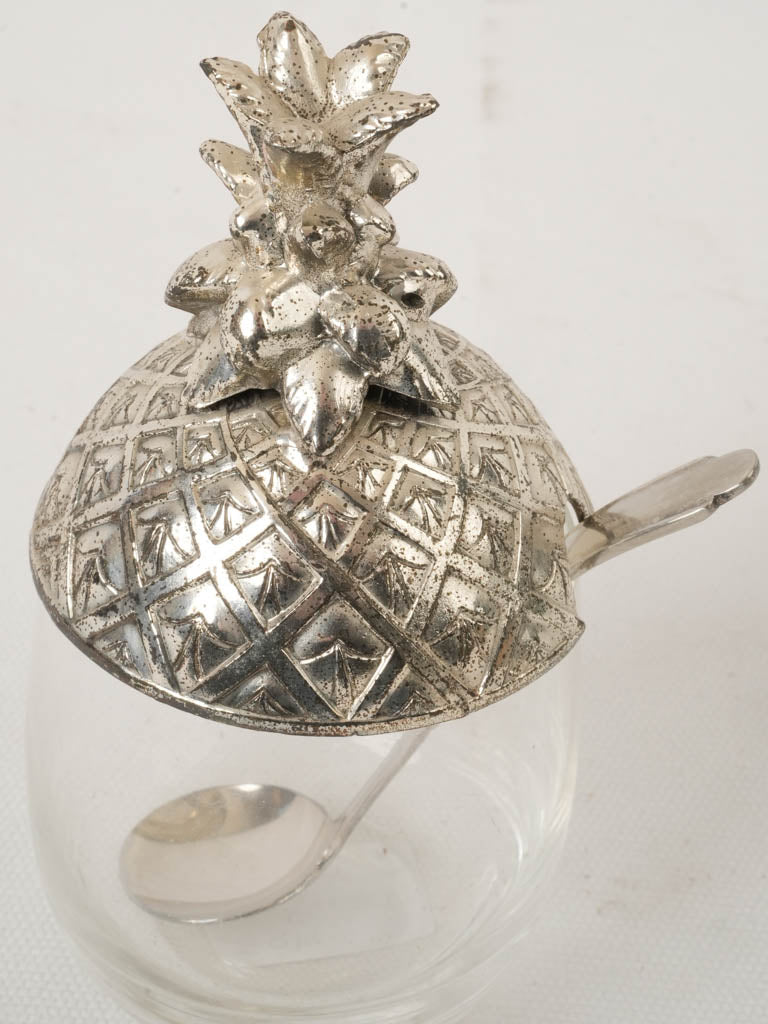 Intricately designed silver jam jar