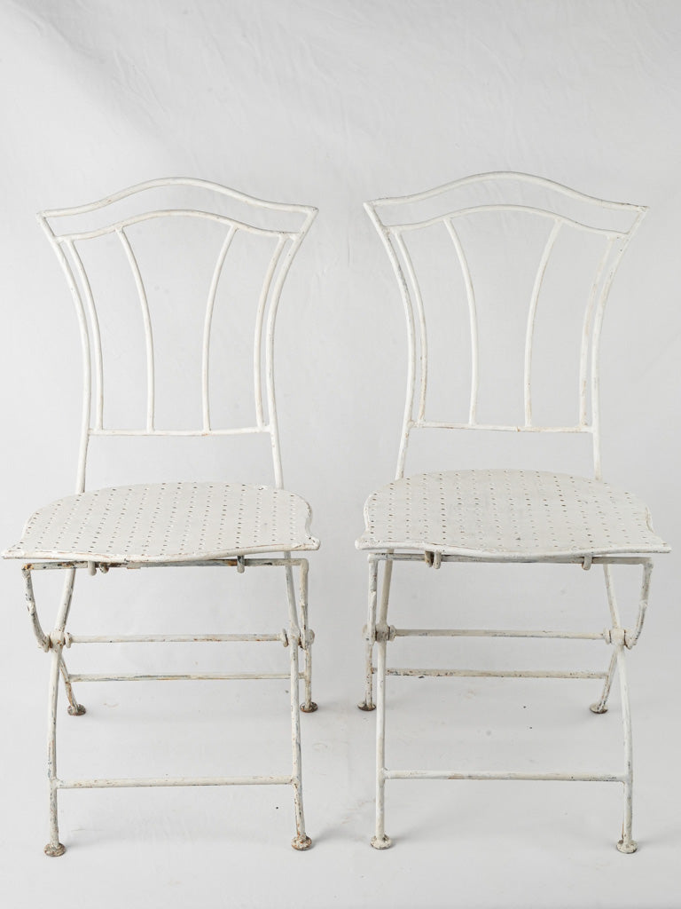 Graceful iron garden chairs