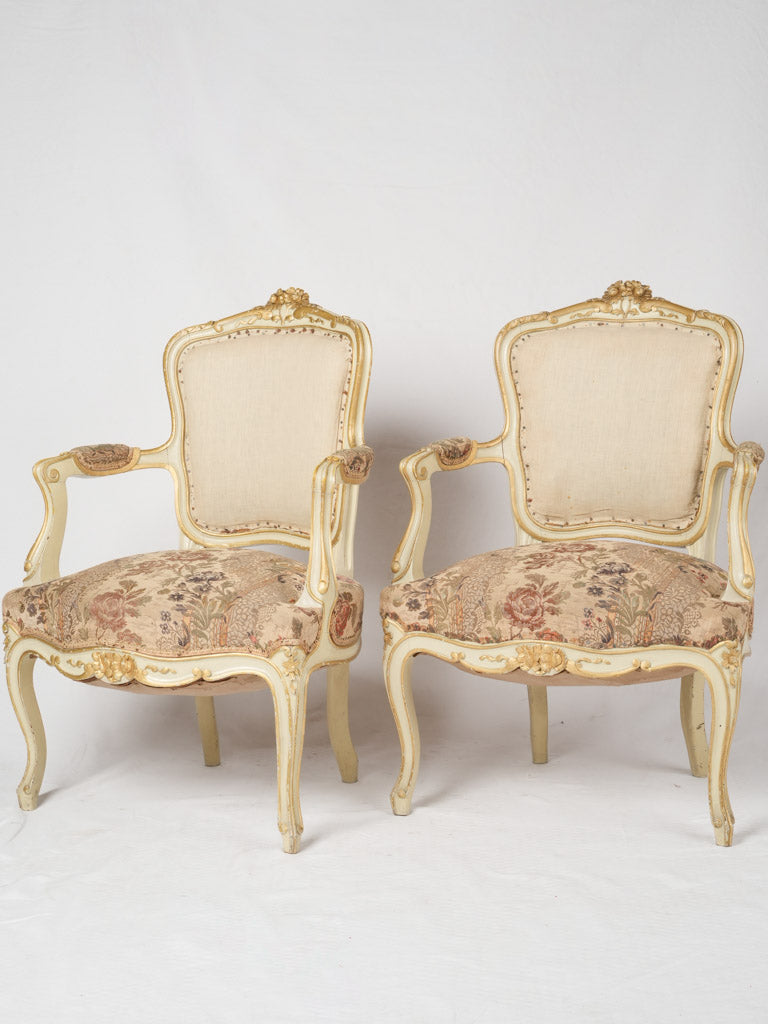 Ornate gilded Louis XV armchairs