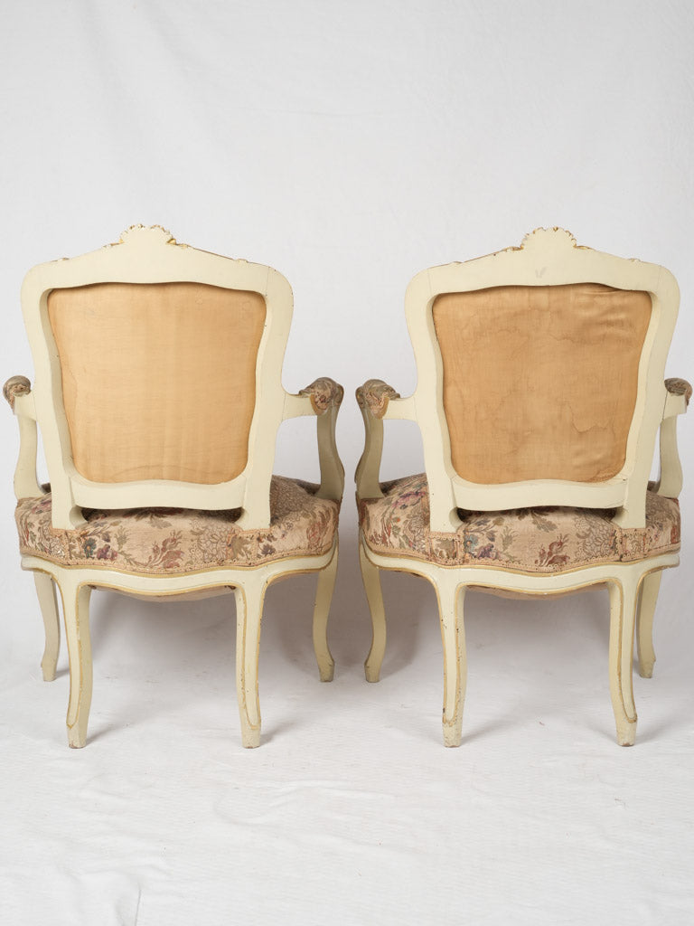 Stunning Louis XV armchairs with floral crests