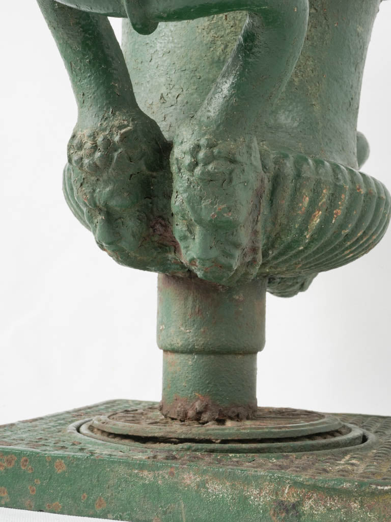 Weathered, green iron Medici urn