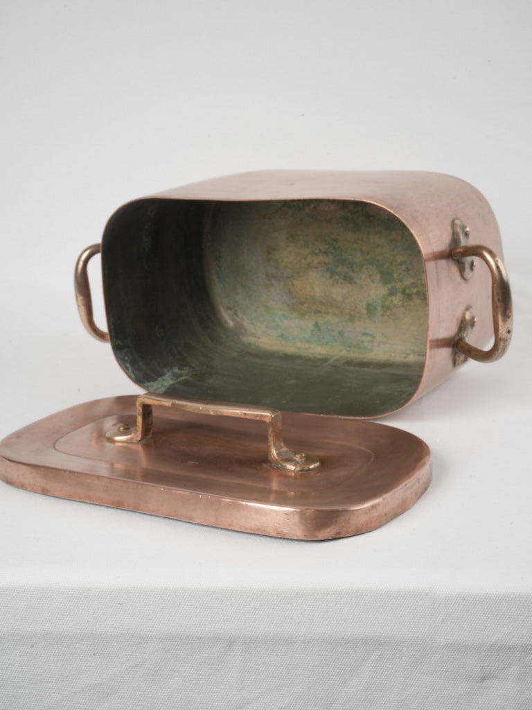 Ornate embossed antique copper pan