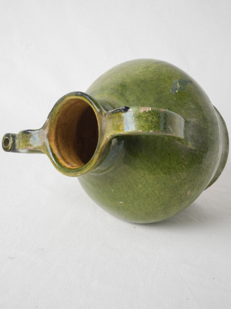 Historic earthy-toned French pitcher