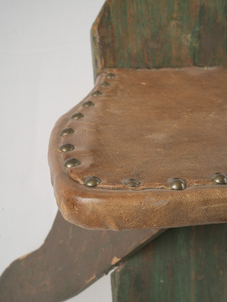 Traditional riveted leather chair